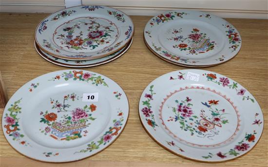 Six 18th century Chinese export famille rose plates and a Masons dish largest diameter 23cm